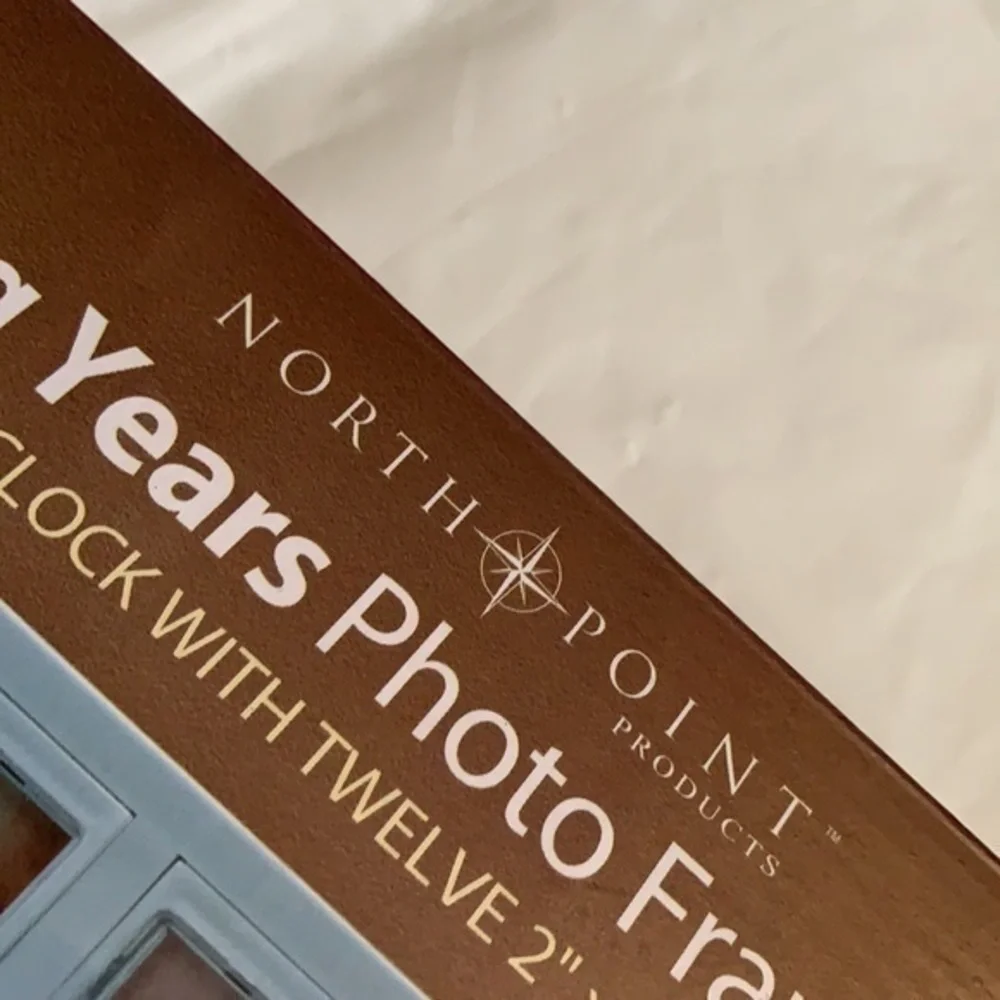 NORTH POINT, PHOTO FRAME WALL CLOCK